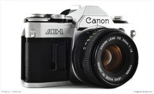 Canon AE-1 (three-quarter view with Canon FD 50mm f/1.8)