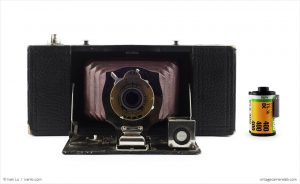 Kodak No. 2A Folding Pocket Brownie (with 35mm cassette for scale)