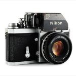 Nikon F (three quarters, with Nikkor 50mm f/1.8 lens)