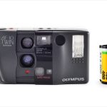 Olympus AF-10 Twin (with 35mm cassette for scale)
