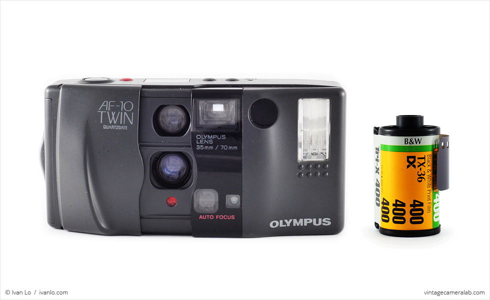 Olympus AF-10 Twin (with 35mm cassette for scale)