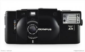 Olympus XA (front view, open with A11 flash attachment)