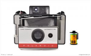 Polaroid Land Model 104 (with 35mm cassette for scale)
