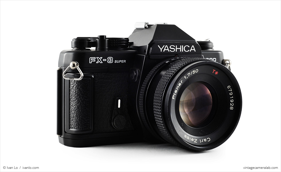 Yashica FX-3 Super 2000 (three quarters, with Carl Zeiss Planar T* 50mm f/1.7)